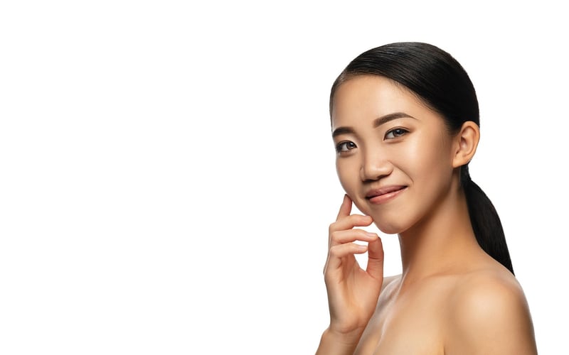 Woman practicing skincare routine